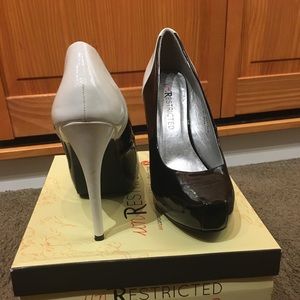 Black and white heels size 8